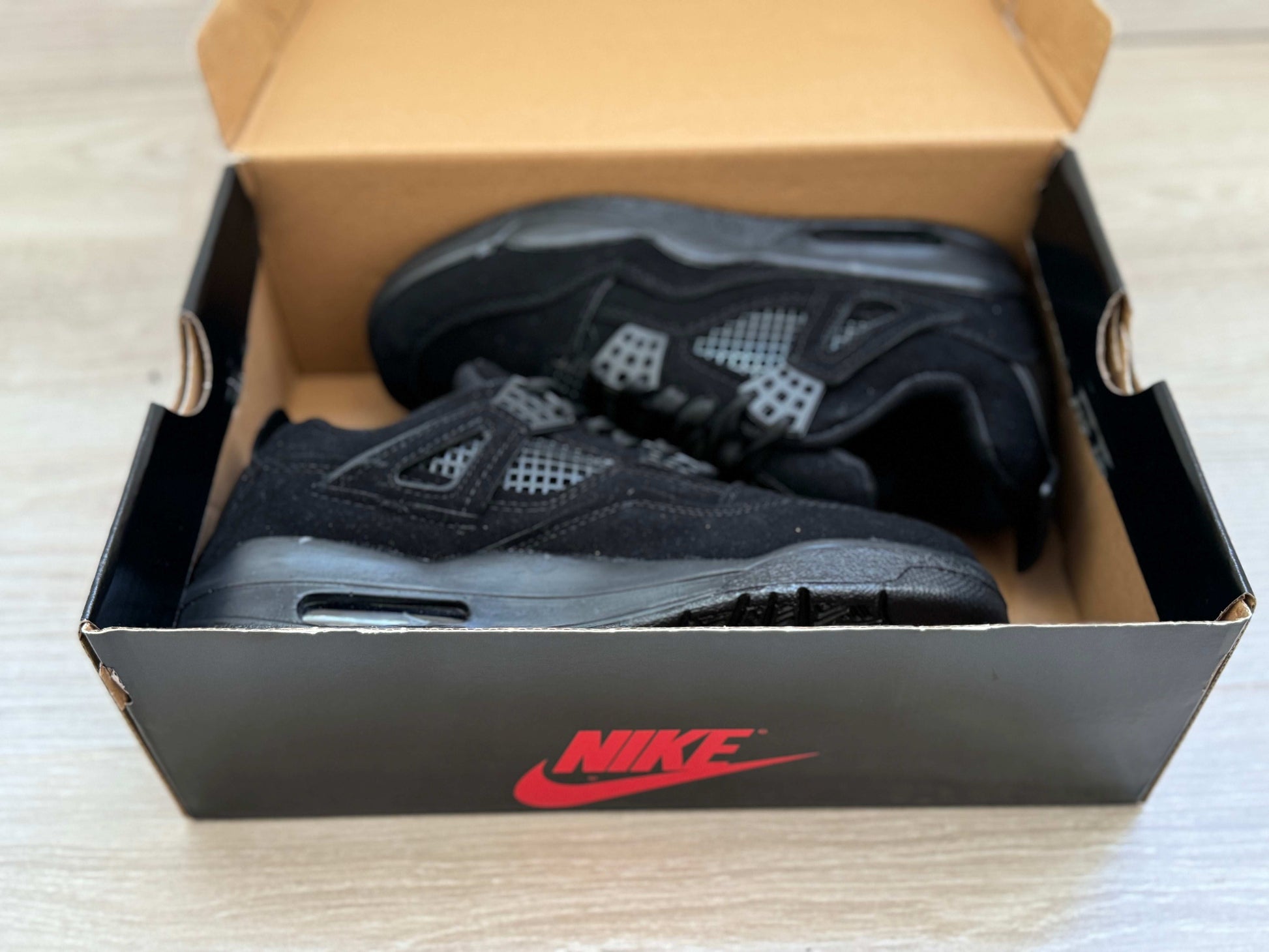 Jordan 4 Black Cat