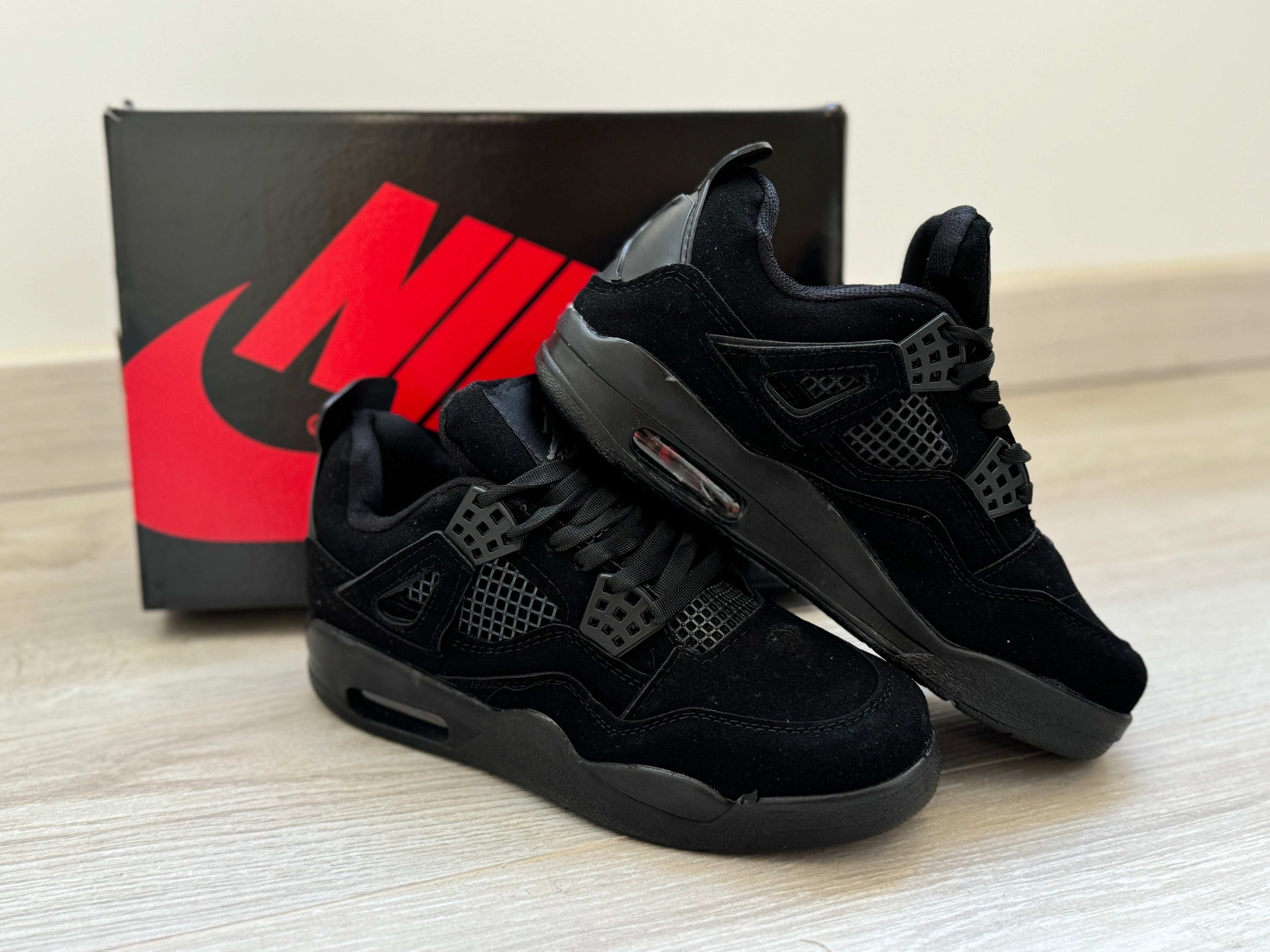 Jordan 4 Black Cat