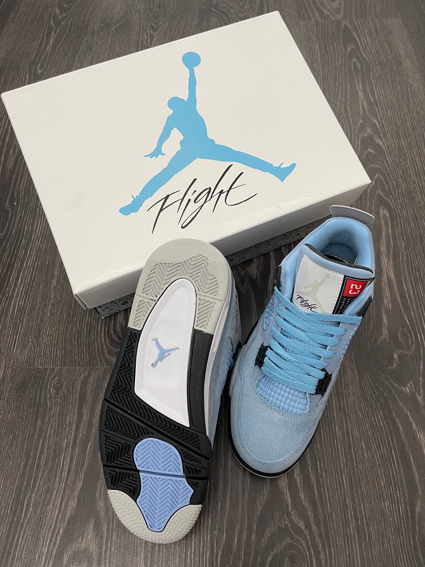 JORDAN 4 Retro University Blue